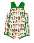 Colorful baby romper with a food-themed print, green straps, and button details