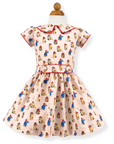 Children's Paddington Bear print dress with red piping and belt.