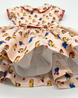 Paddington Bear print dress with red piping and layered petticoat