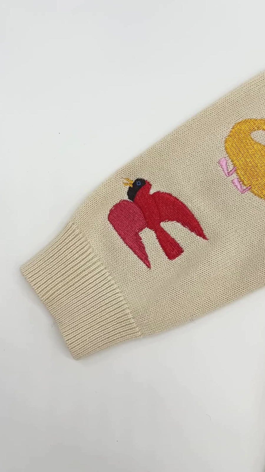 A detailed video showcase of the Brown Bear knit sweater with close-ups of the animal designs