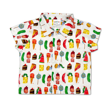 Flat lay shot of a short-sleeved button-up shirt with a colorful food-themed print, featuring ice cream cones, cakes, lollipops, cheese, and other treat